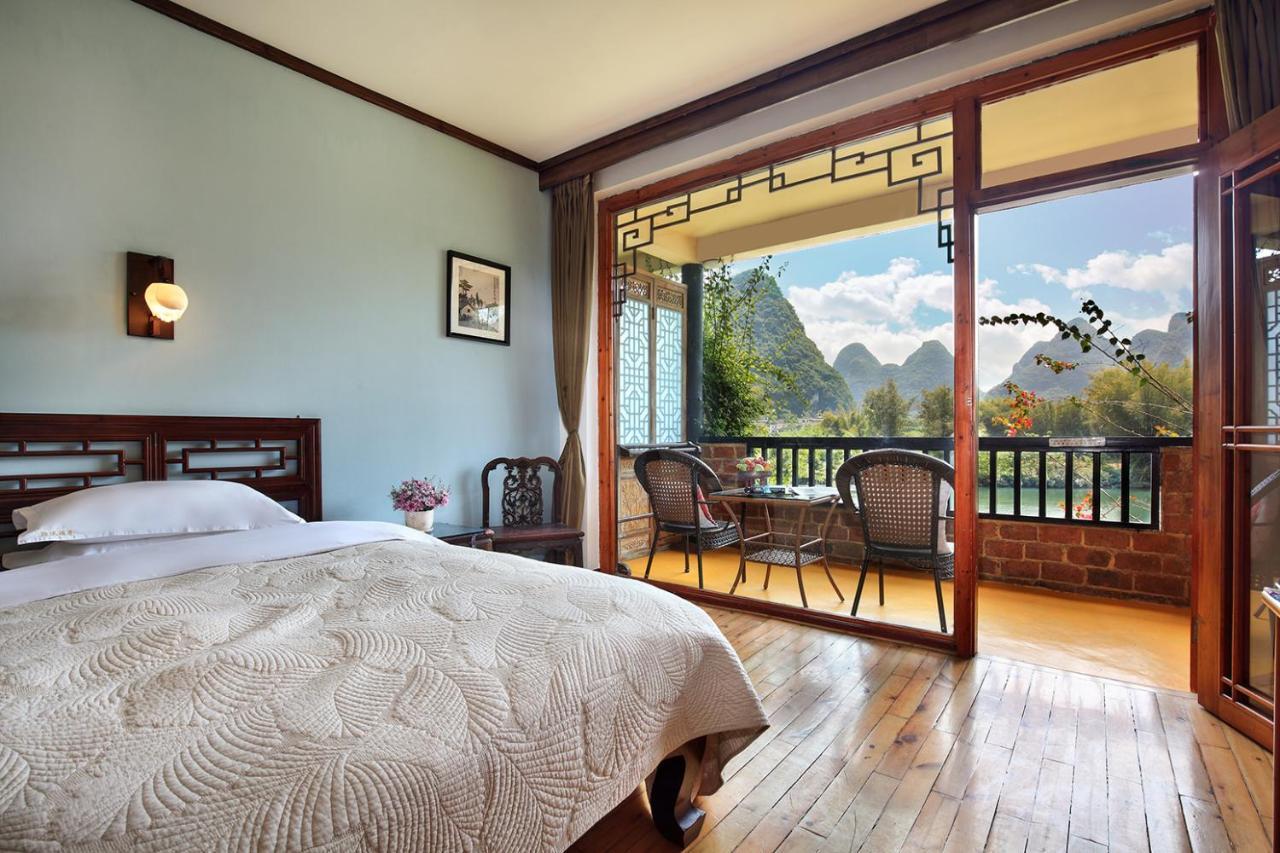 Отель Yangshuo Mountain Retreat Экстерьер фото